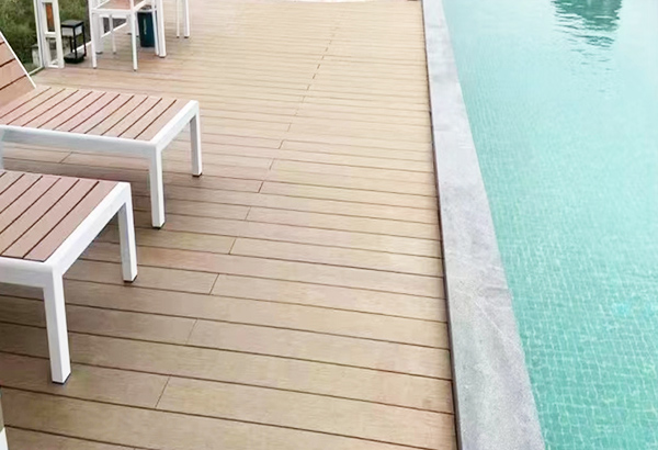 Outdoor Decking Surrounding a Pool Area for Relaxation and Entertainment